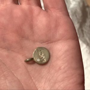 Sterling silver circle luck charm